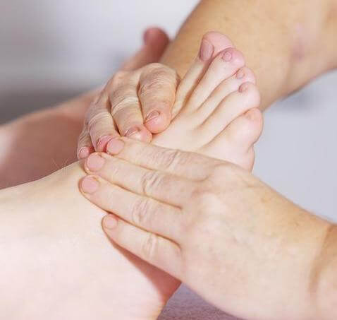 Massaging anti-inflammatory essentials into the pain of plantar fasciitis helps speed recovery.