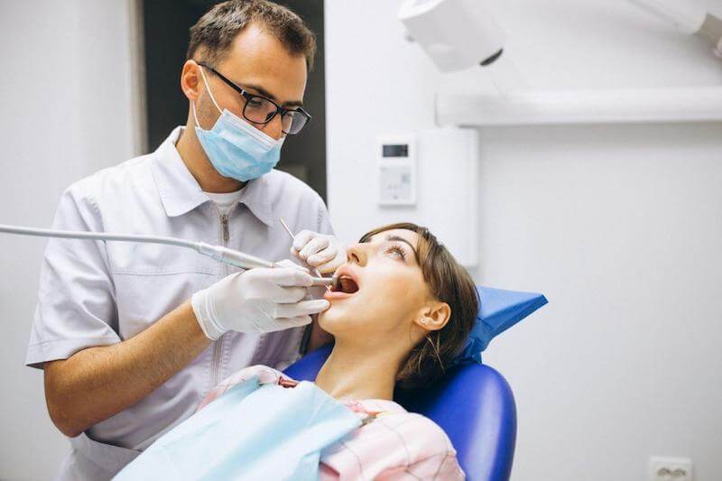 First, the dentist will numb the patient around the tooth with a local anesthesia.
