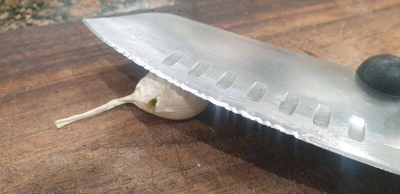 One smash with the side of your knife, and the whole peel can be taken away, easy peasy.
