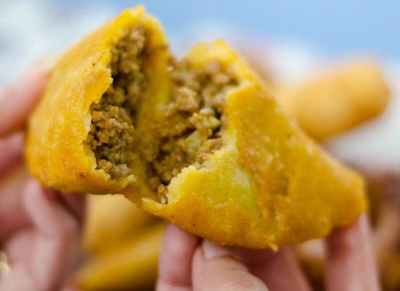 Cornmeal flour empanadas filled with meat made from harina pan are a Venezuelan staple.