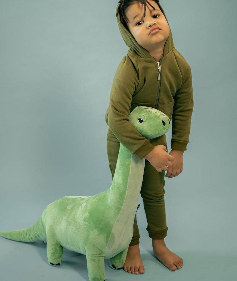 It doesn’t take long to turn a frown upside down with a weighted dinosaur buddy by your side!