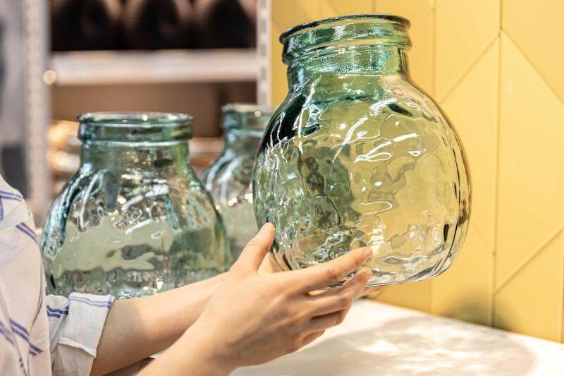 Any clean glass jars will do for structuring water, they should be around the same capacity. 
