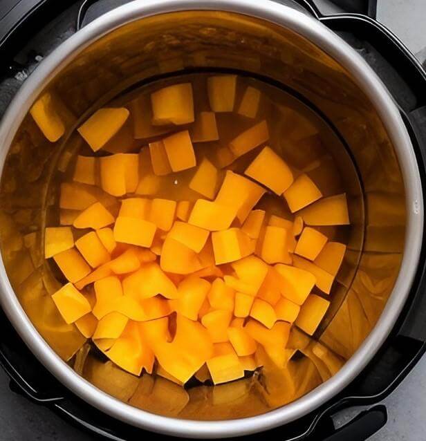 Add the chicken or vegetable broth to the golden beets in your instant pot.