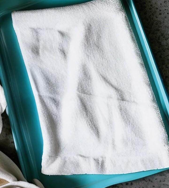 An absorbent cotton huck towel works perfectly for pat drying the potatoes after they have been rinsed several times in water to get rid of the excess starch. 