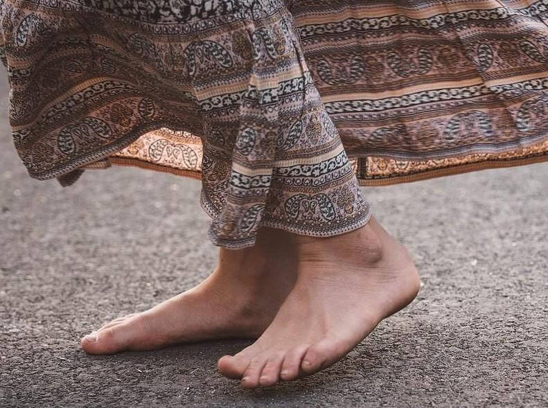 Walking around barefoot while trying to heal a toe infection or ingrown toenail is not recommended.  Keep your feet clean and dry.