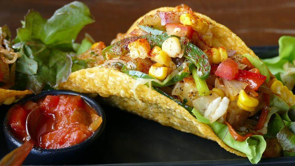 Processed, GMO (Genetically Modified Organism) corn like the kind that is used to make tacos, poses a higher risk to those with gout than fresh, organic corn.