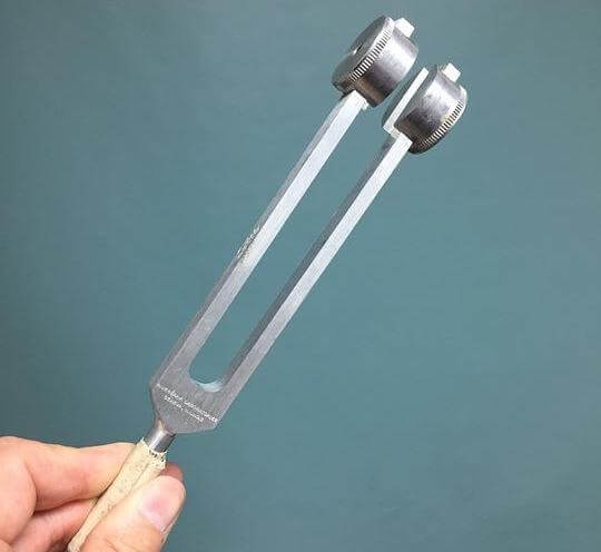 Weighted tuning forks are frequently used in hearing tests. 