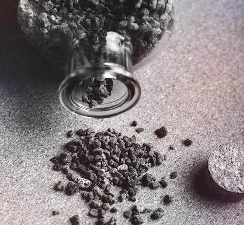 Activated charcoal is taken in granular form and ground into a fine powder for ingestion. 
