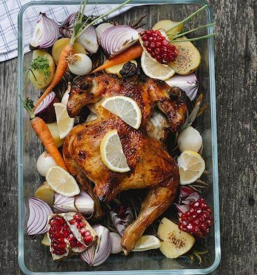 Simple roasted, non-processed chicken paired with fresh fruits and vegetables.