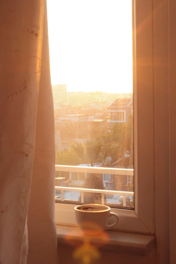 morning coffee on a sunlit windowsill as a gentle light anchor
