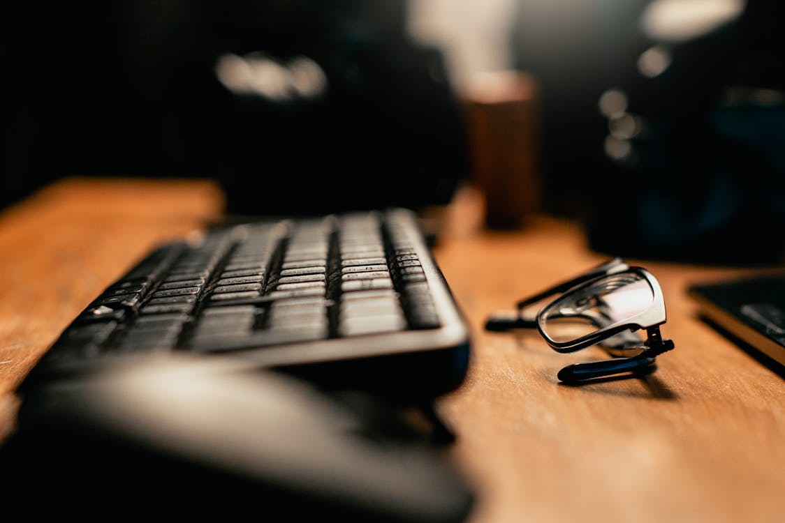 Focused work desk with keyboard for pomodoro technique for deep work