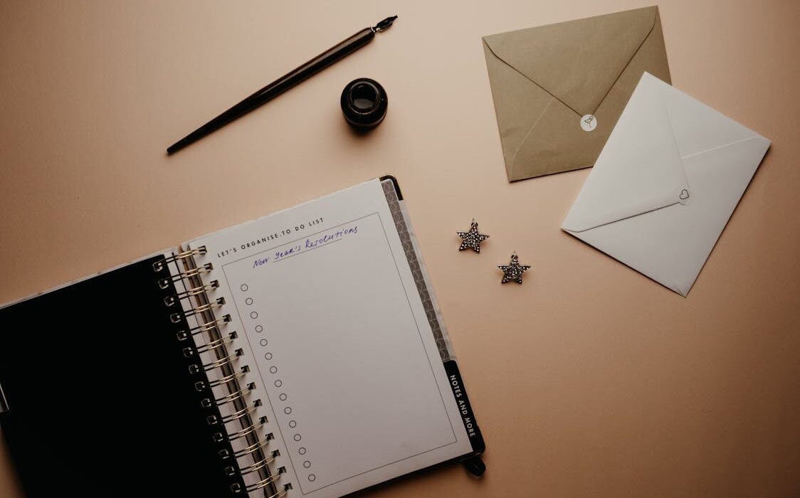 Journaling notebook and pen for interstitial journaling for productivity