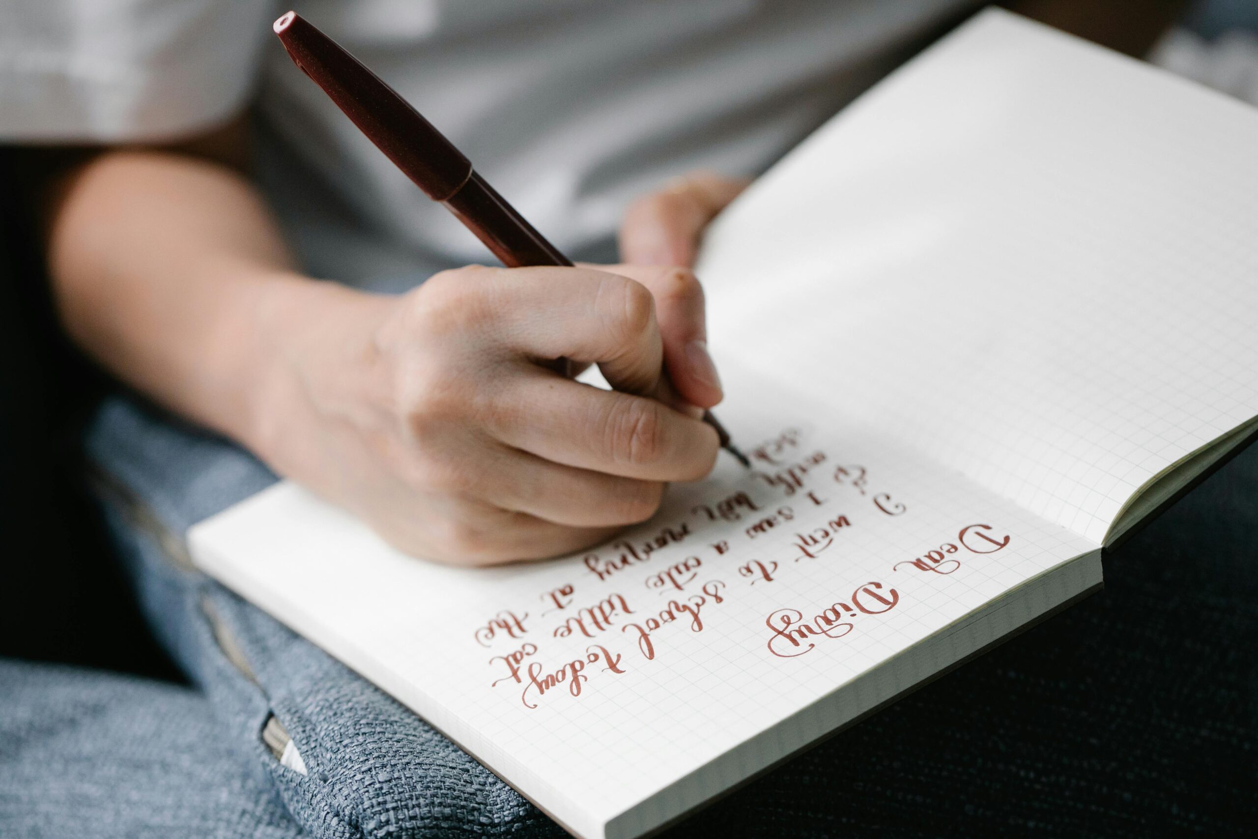 Handwritten morning pages showing flowing cursive script in a personal journal