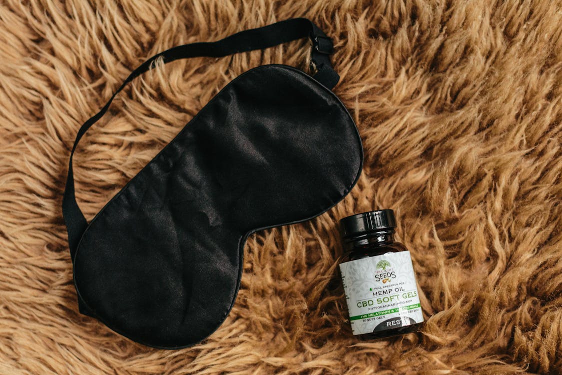 Natural sleep supplements without melatonin with eye mask and essential oil
