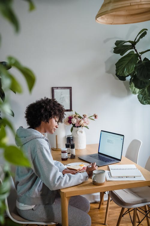 Woman doing focused work in the morning using eat the frog method