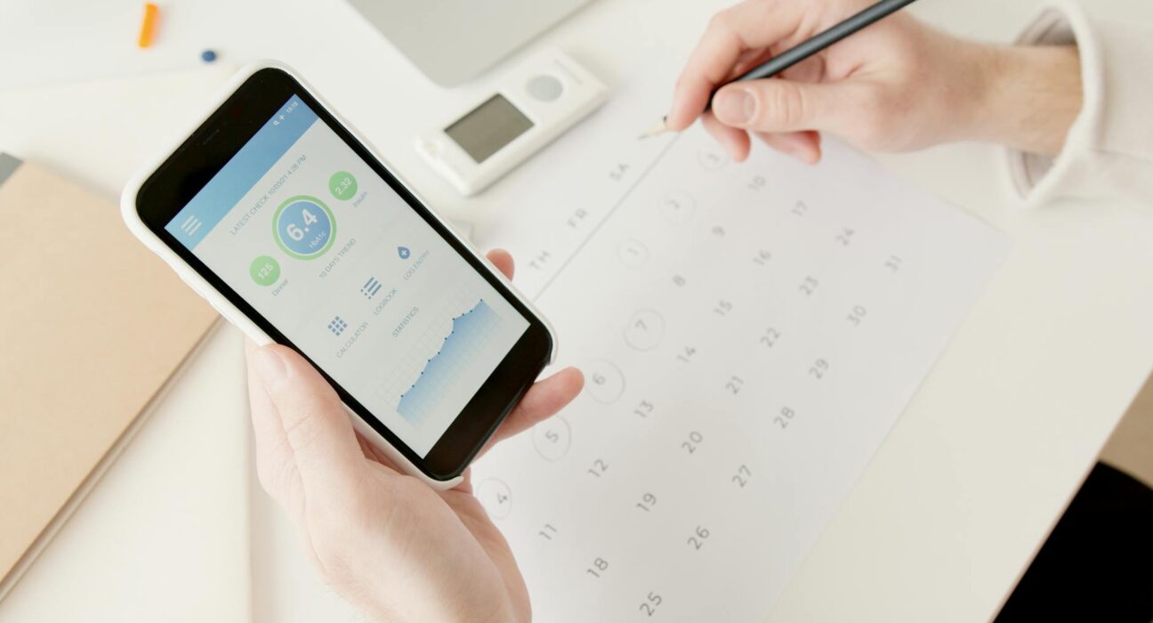 Heavy metal detox tracking — calendar, journal, water with lemon, chlorella tablets