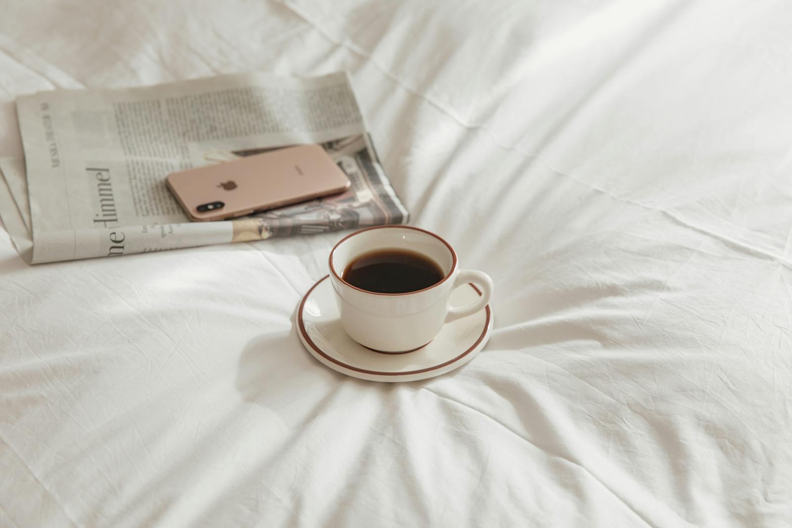 Morning coffee on a bed as a habit stacking anchor