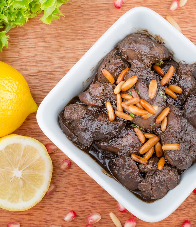 cooked beef liver on plate showing whole food nutrition for beef liver supplements benefits