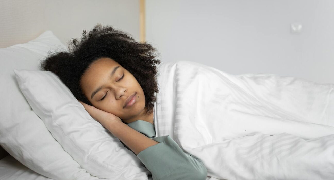 Woman sleeping peacefully after drinking tart cherry juice for sleep