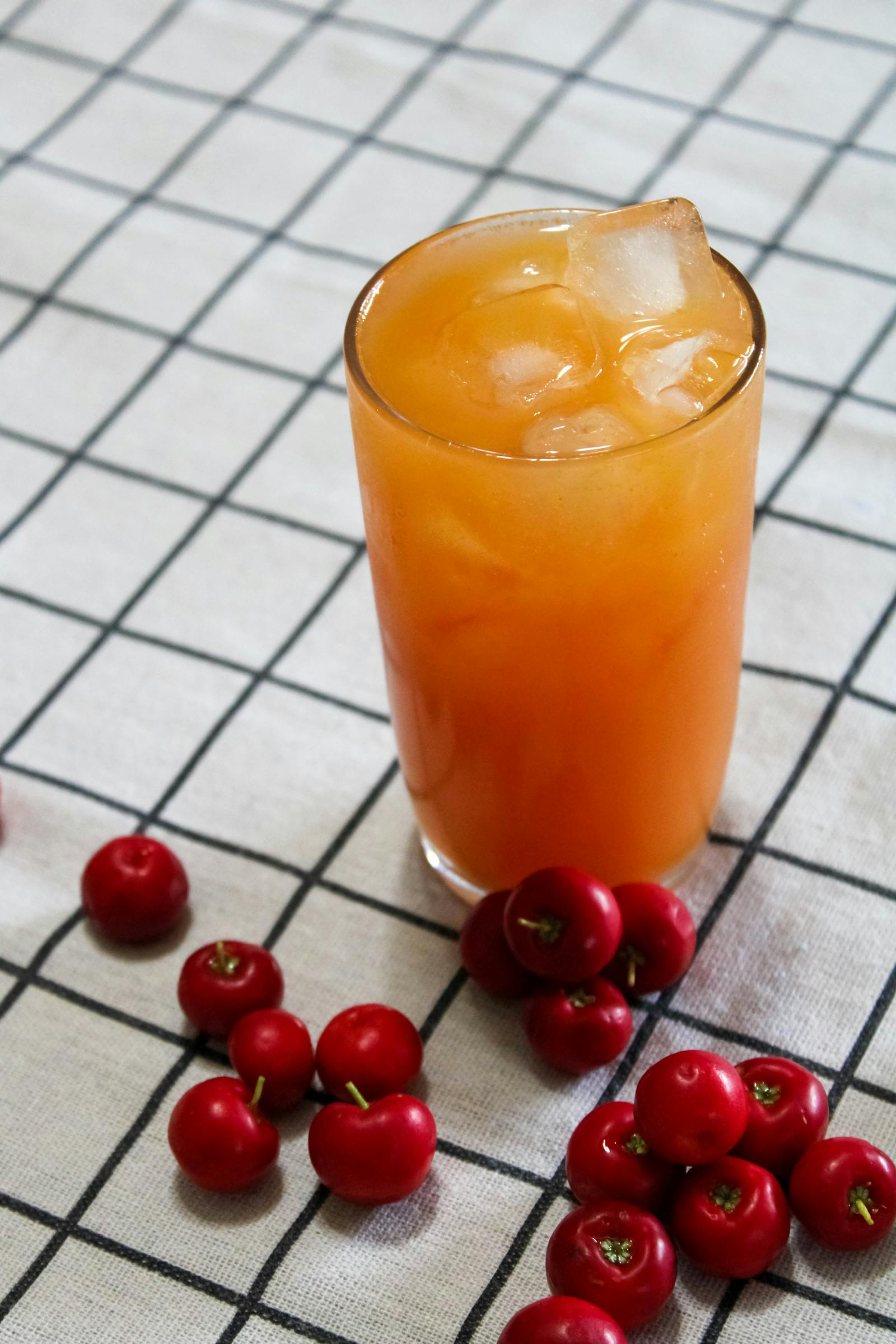 Tall glass of tart cherry juice for sleep ready for a bedtime drink