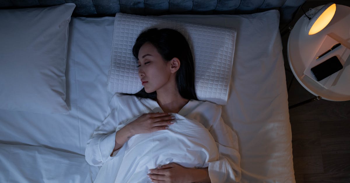 person sleeping deeply in bed