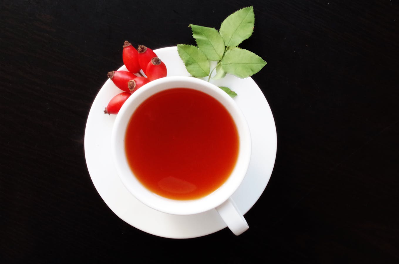 Schisandra berry tea brewing in a glass cup