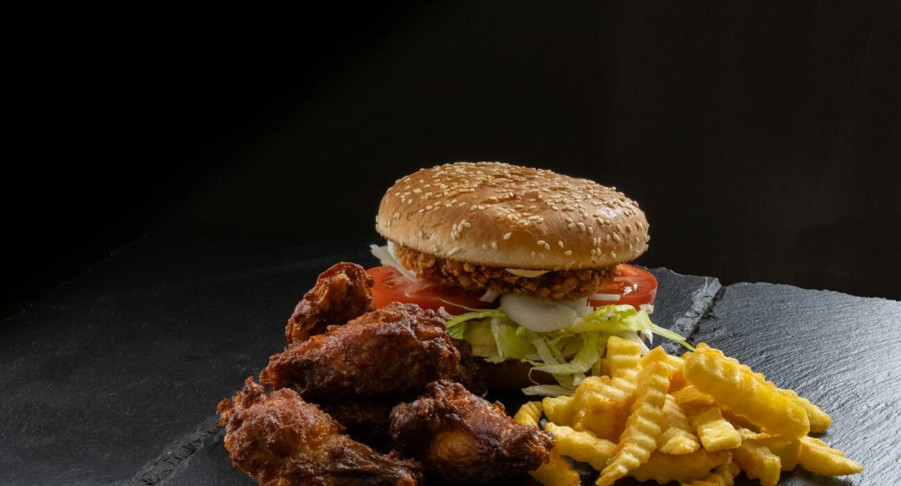 Chick-Fil-A chicken sandwich and waffle fries representing calorie calculator