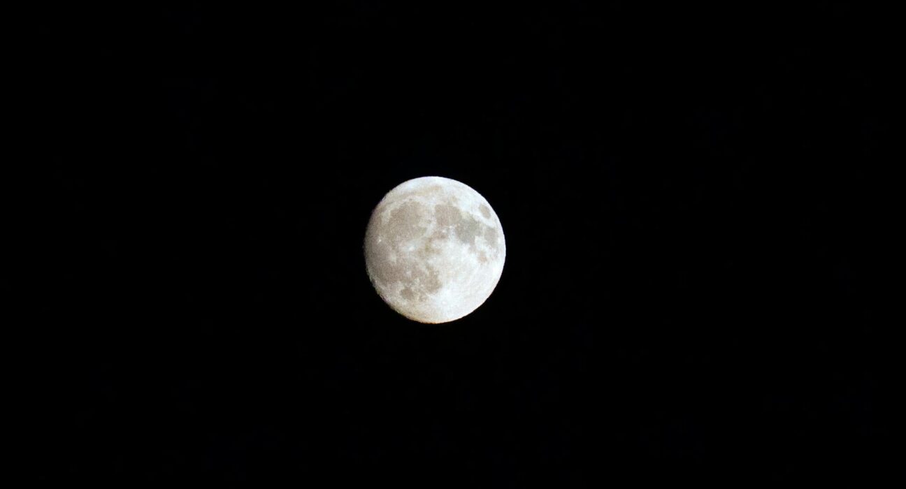 Full moon night sky representing parasite cleanse window