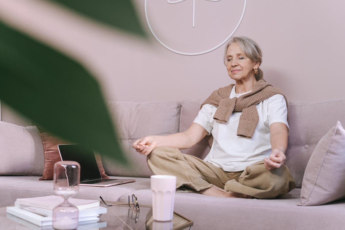 Woman resting peacefully before a castor oil pack for thyroid