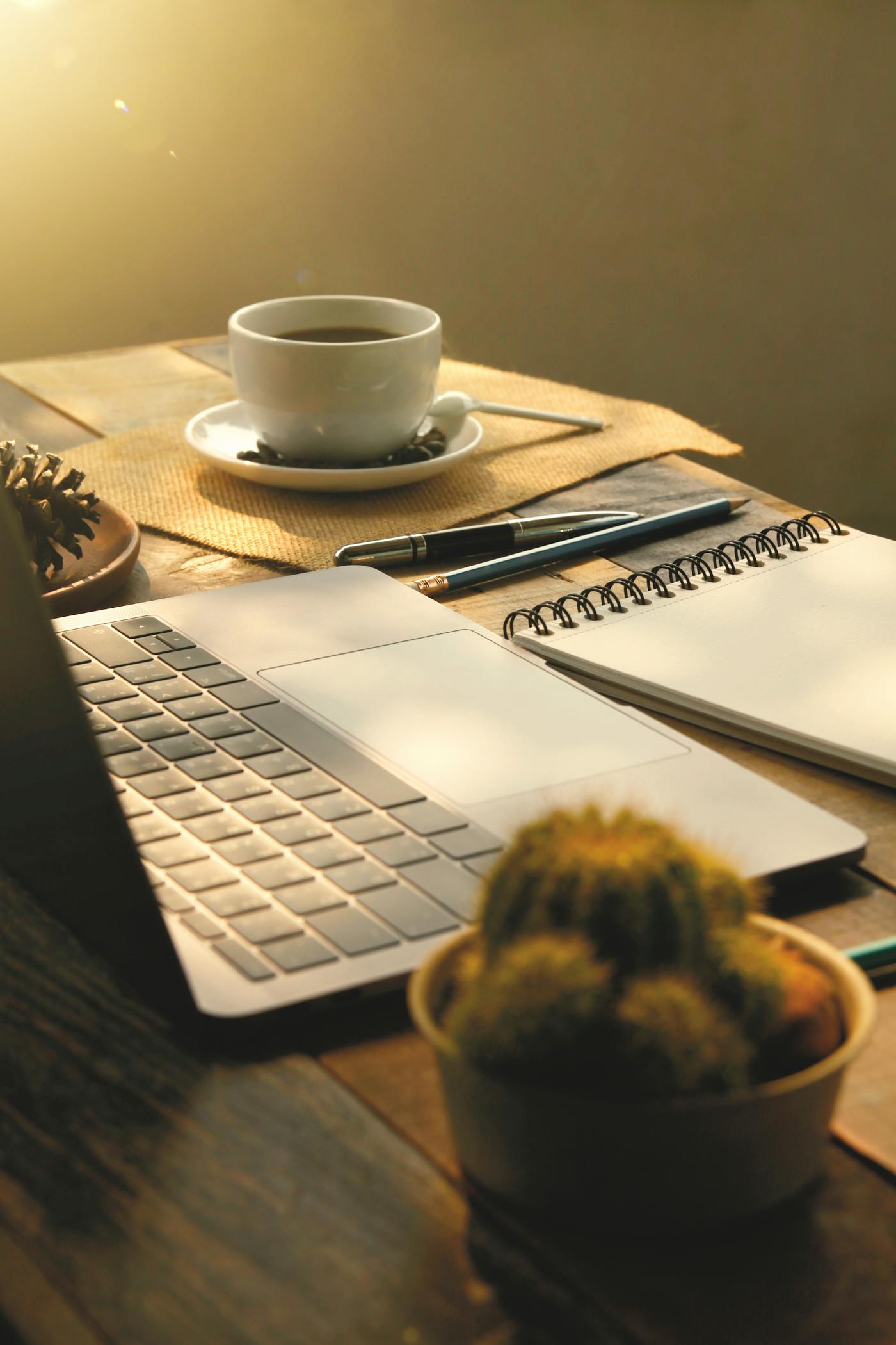 Sunlit morning workspace ready for an eat the frog method block
