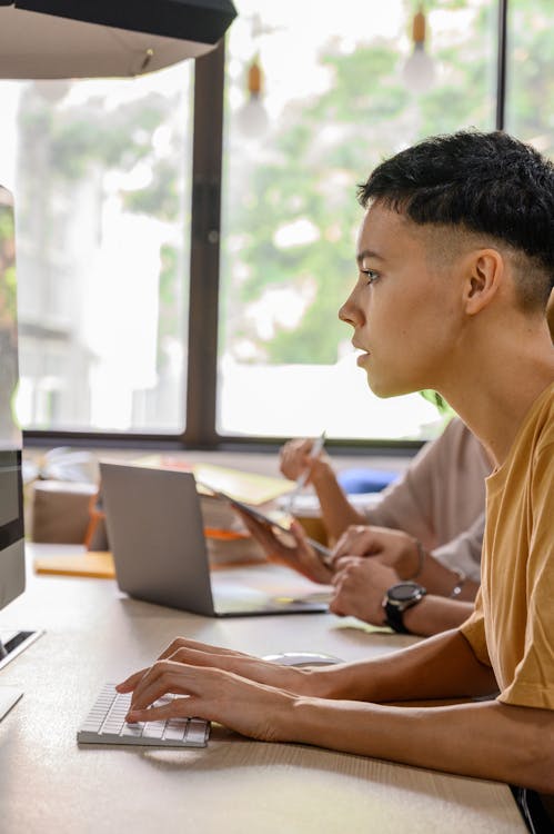 woman using laptop with parkinson law deadline approach