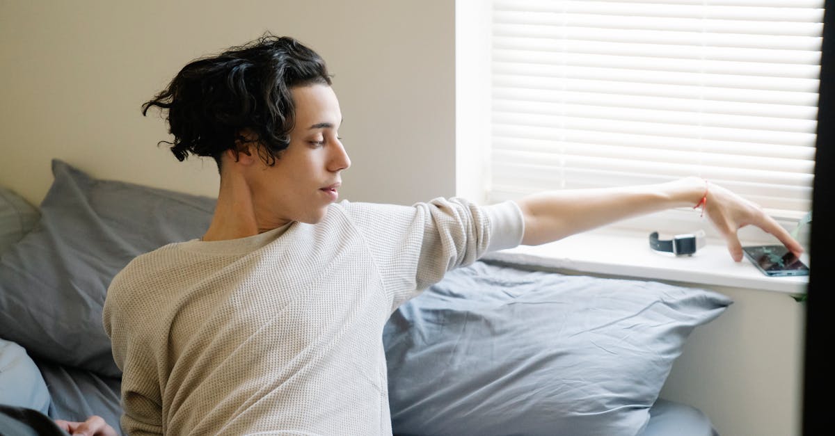 person checking phone first thing in morning