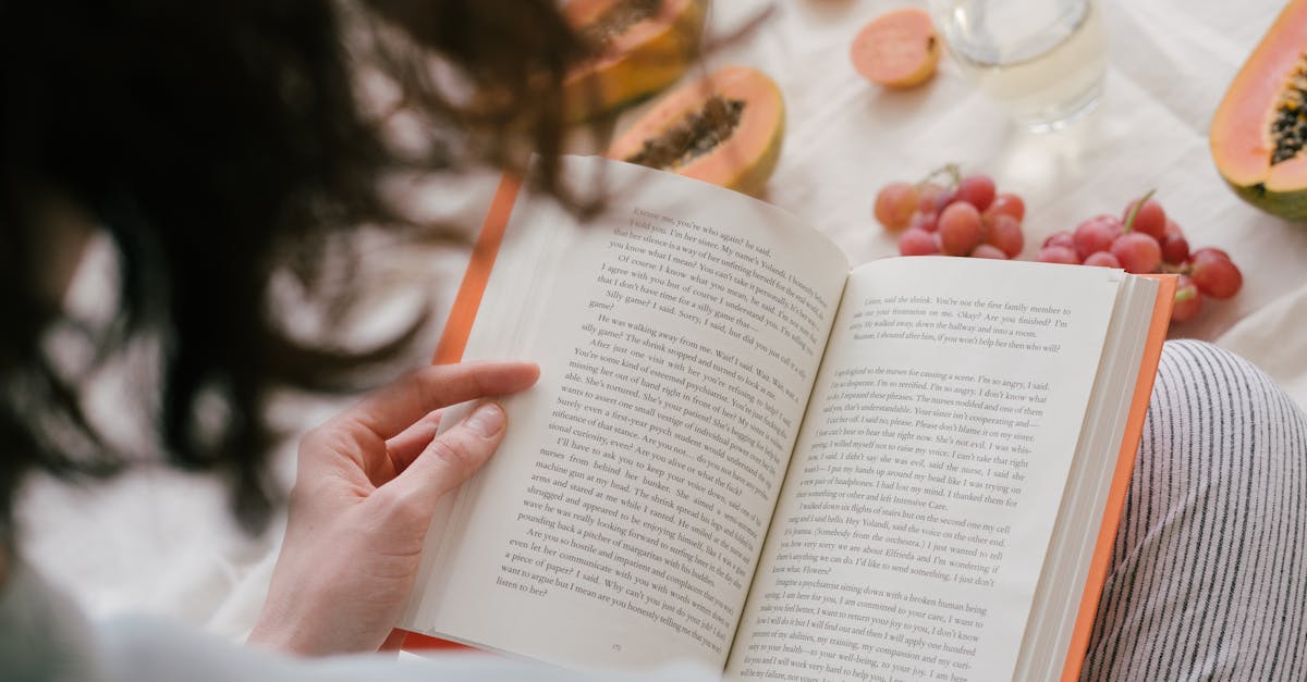 person reading a book in the morning