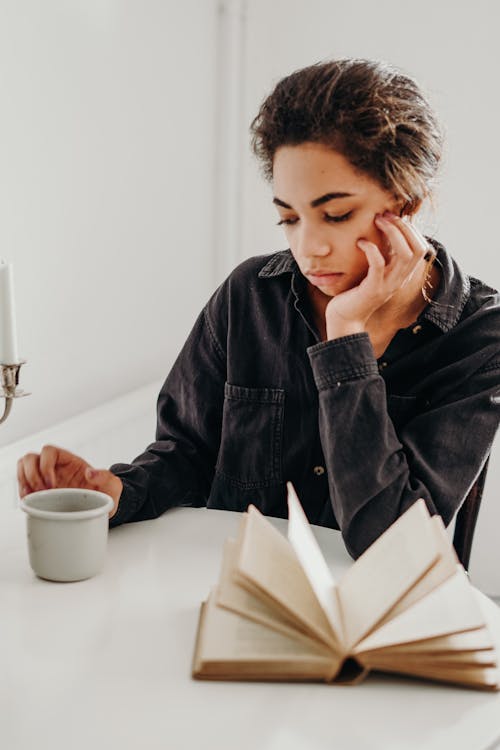 thinking woman using the premortem technique for better decisions