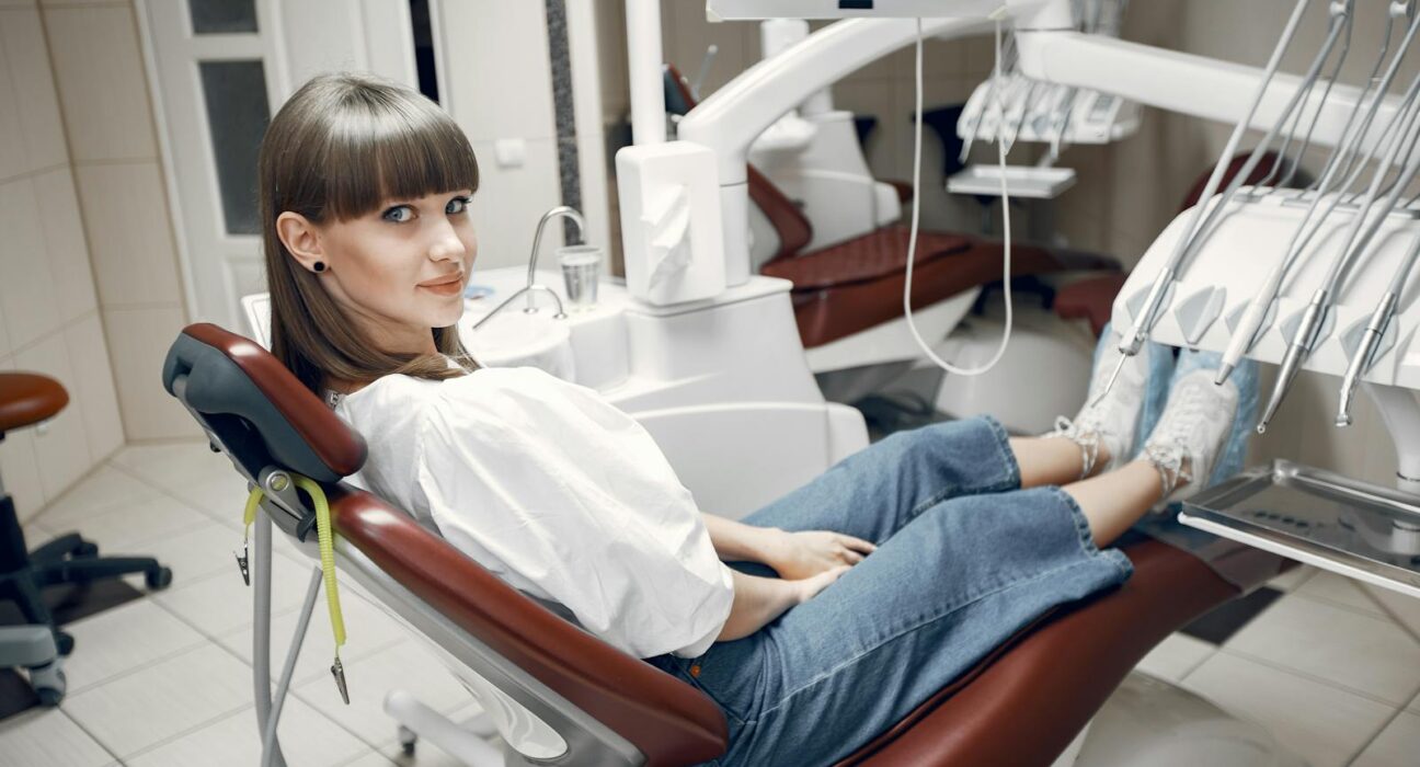 Calm patient seated in modern dental clinic before sedation dentistry procedure