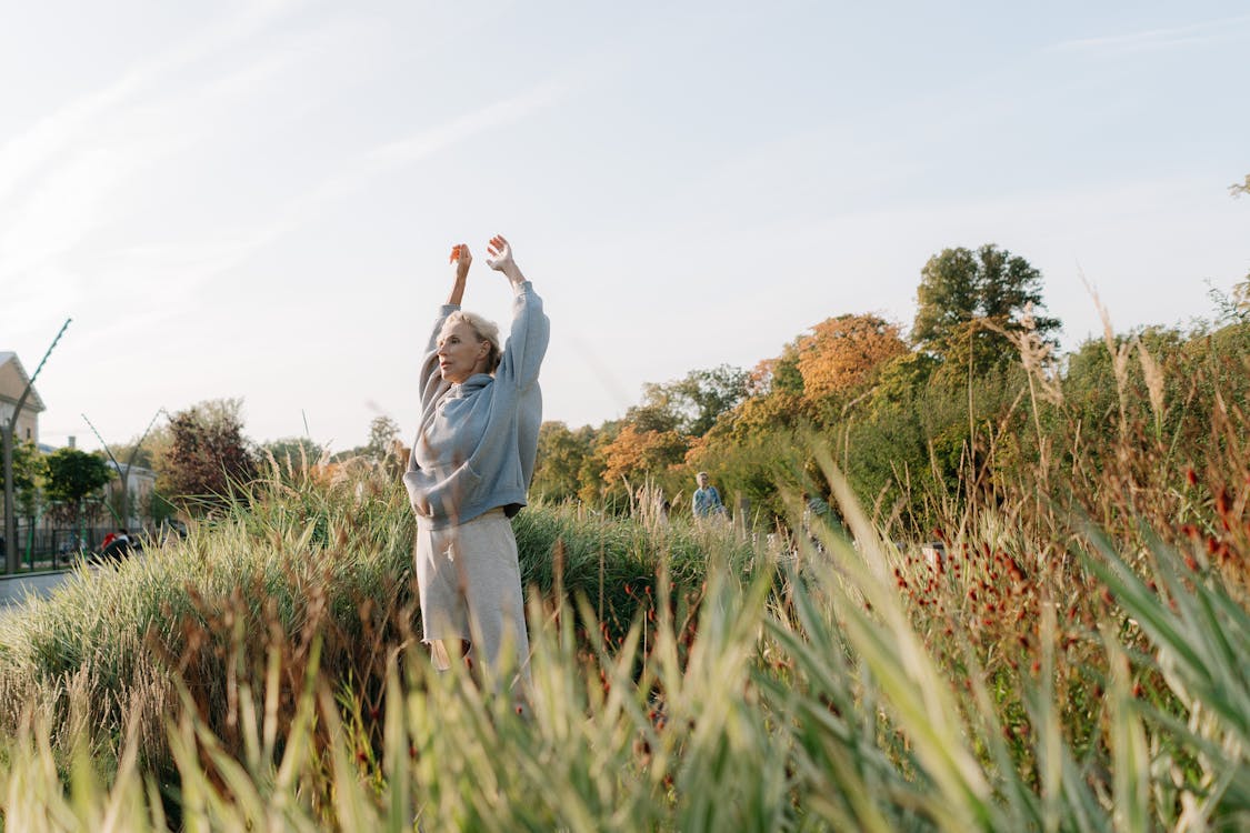 woman stretching to support cellular renewal and longevity