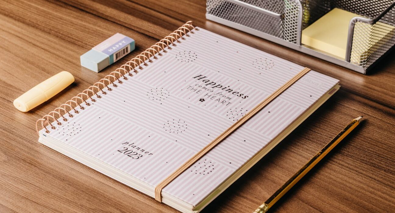 Two-minute rule for daily productivity planner on a wooden desk