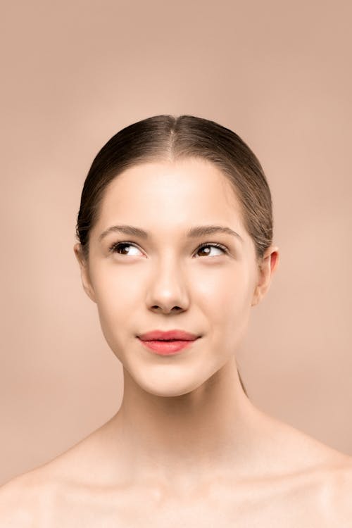 Woman with healthy glowing skin from chlorophyll water benefits