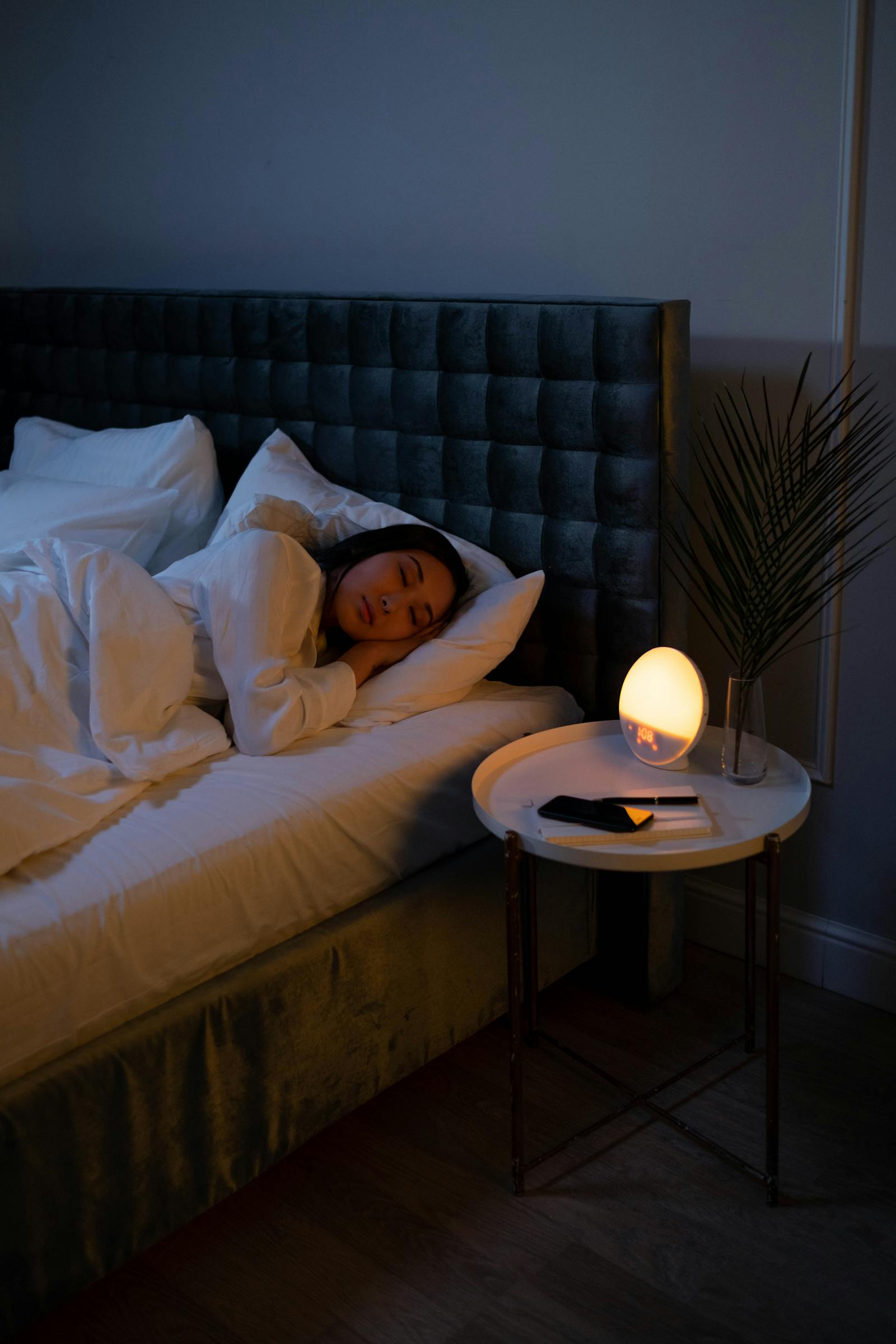 Calm bedroom scene at night with soft lighting promoting restful sleep