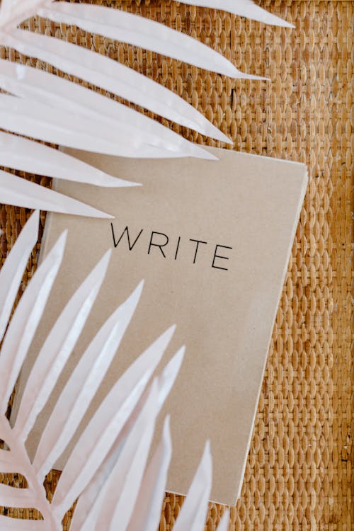 writing in a worry journal to manage anxious thoughts