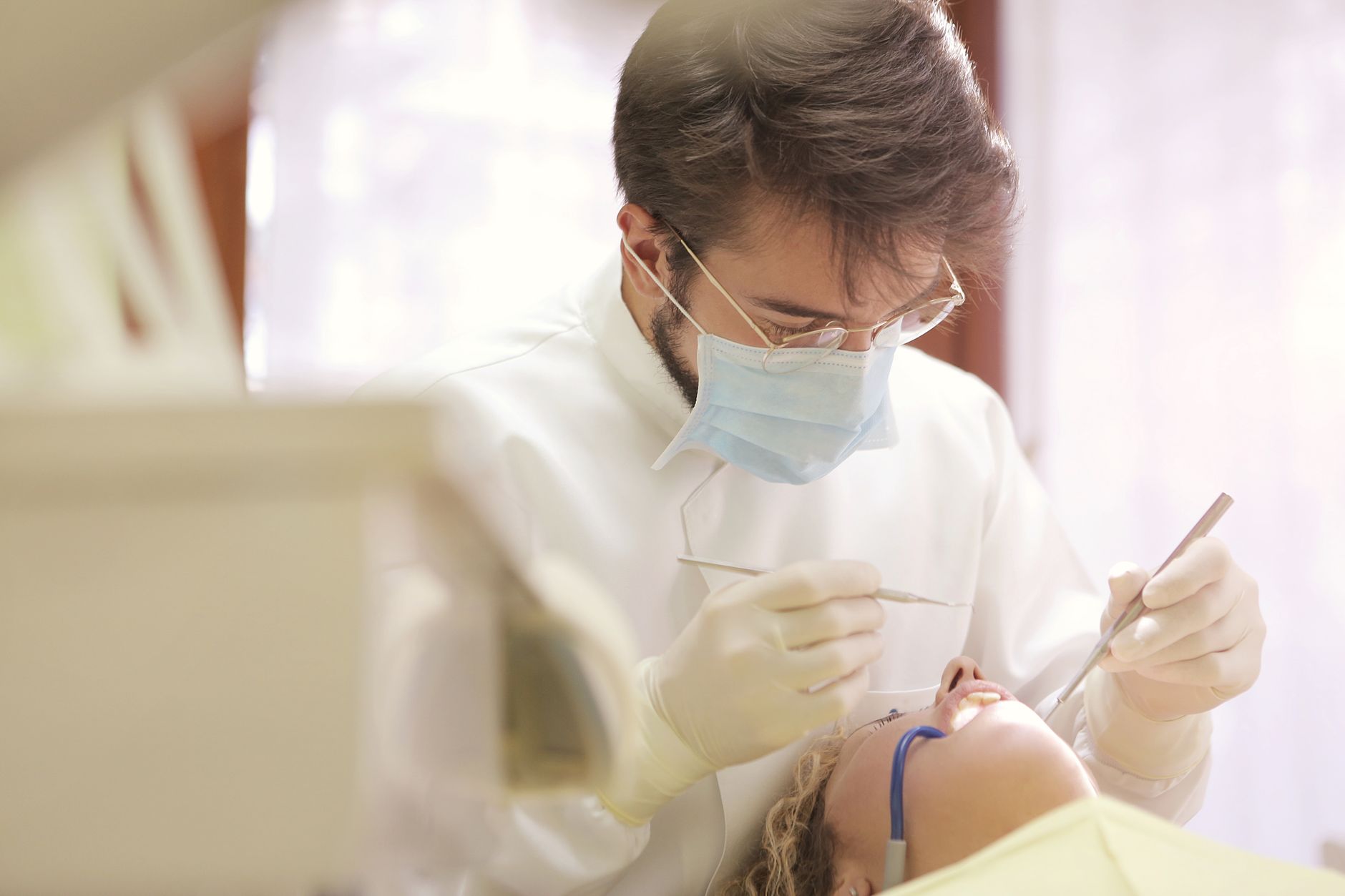 Close-up clinical view of a silver mercury amalgam dental filling in a tooth